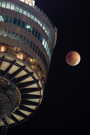 coppery coloured moon during a lunar eclipse