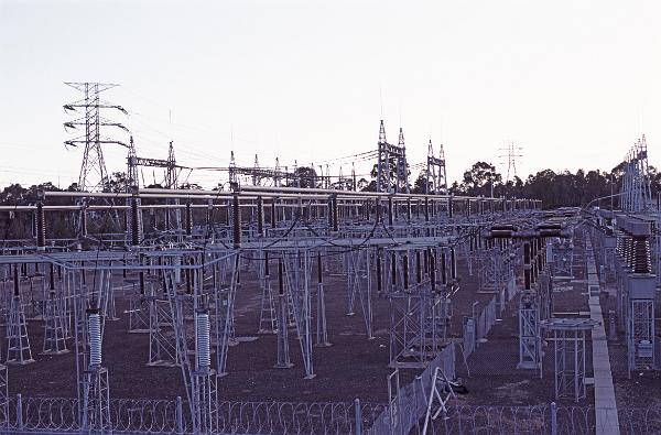 a large electricity distribution switching station. equipment allows power to be routed in different ways and to isolate transmission lines under fault conditions