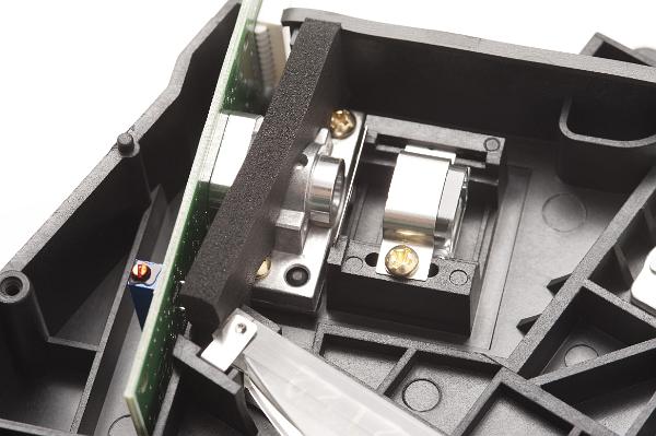 the inside of a laser printer and the semiconductor laser used in the process to transcribe the printed page onto paper