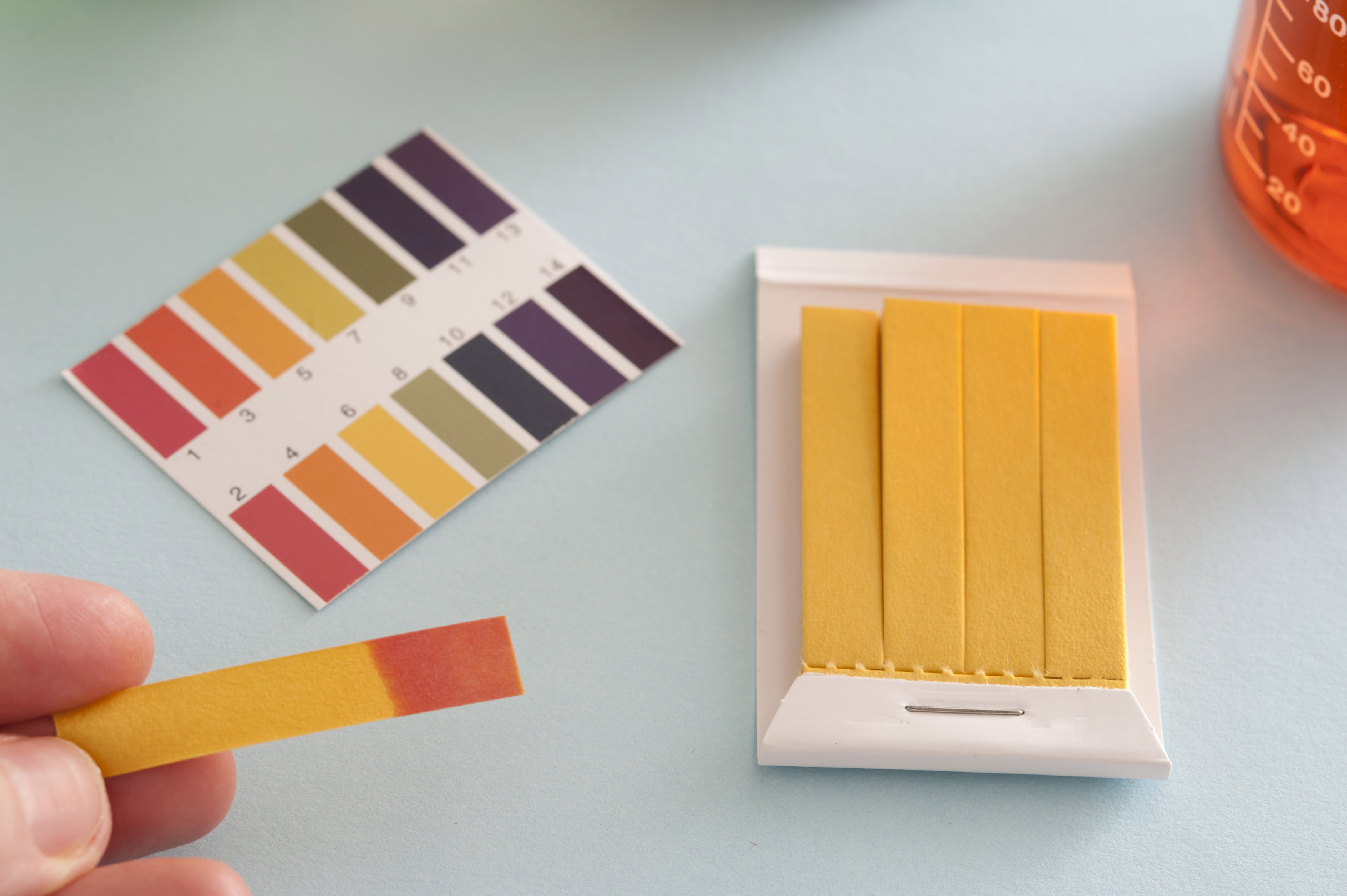 Free Stock image of Man doing a chemistry acid test using litmus paper ...