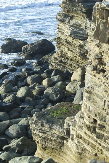 sedimentary rock layers layered sedimentary cliffside rocks at cabrillo national monument, san diego california
