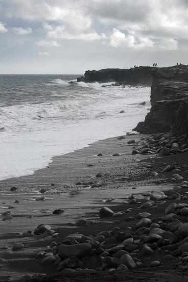 black volcanic beach black volcanic rock coastline on the big island of hawaii the back voncanic sand is formed the sea erroding the solidivied lava flows, Kalapana beach